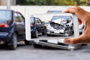 Photo of car accident on road. How to Determine Who is at Fault in a Texas Car Accident. Car Accident Lawyer in Arlington Tx