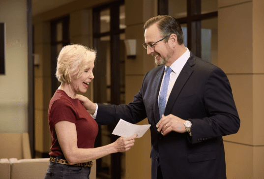 Dallas personal injury lawyer reviewing case documents with an injury client during a free consultation