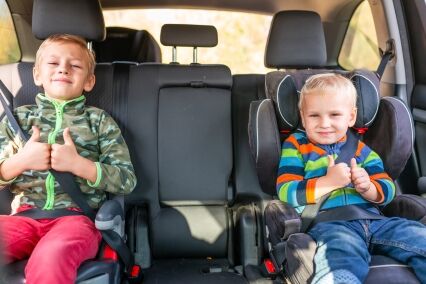 stop using what age can a child sit without a booster